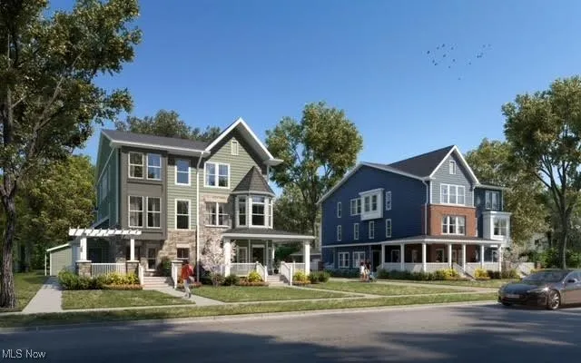 View of front of house with a front lawn and covered porch