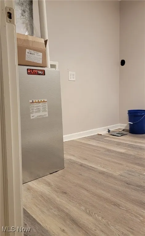 Interior details featuring hardwood / wood-style flooring