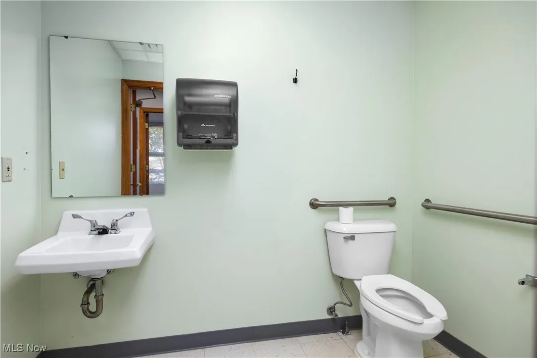 Bathroom featuring toilet and sink
