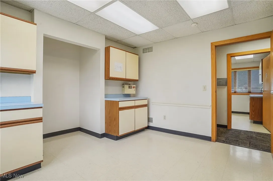 Kitchen with a paneled ceiling