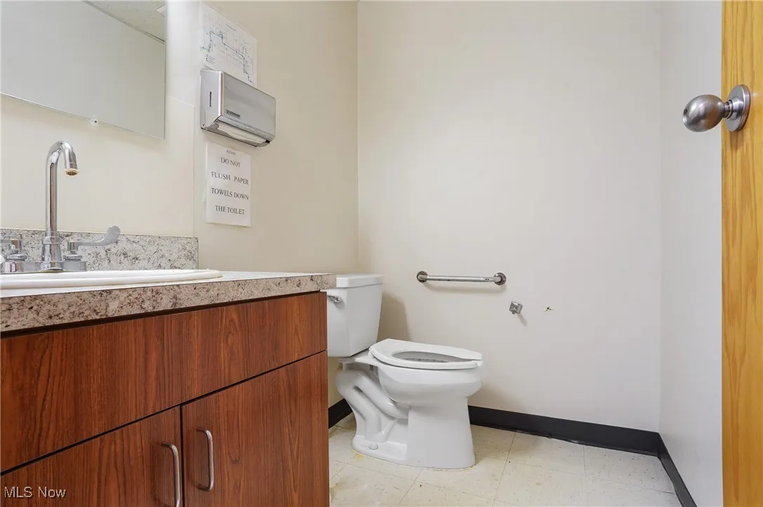 Bathroom with vanity and toilet
