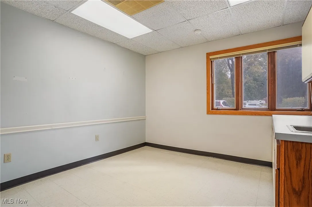 Spare room featuring a drop ceiling