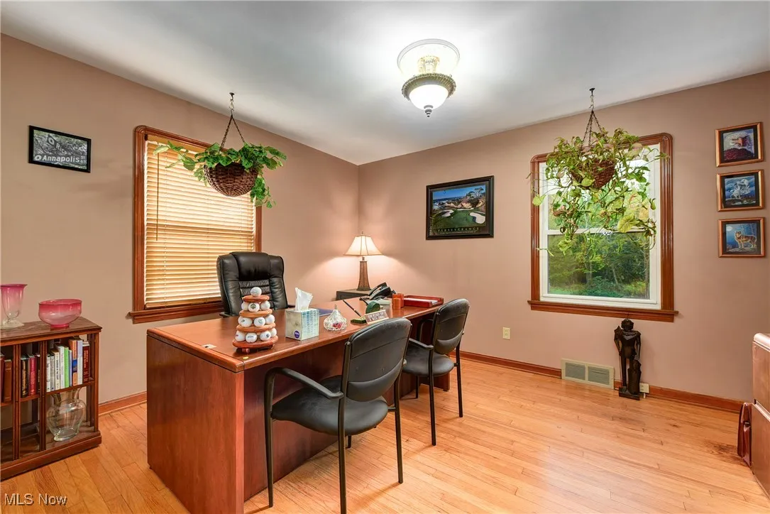 Office space featuring light hardwood / wood-style flooring