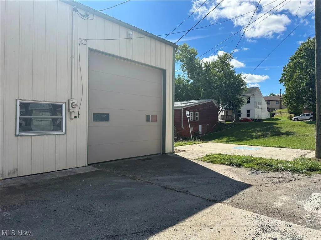 Garage with a lawn