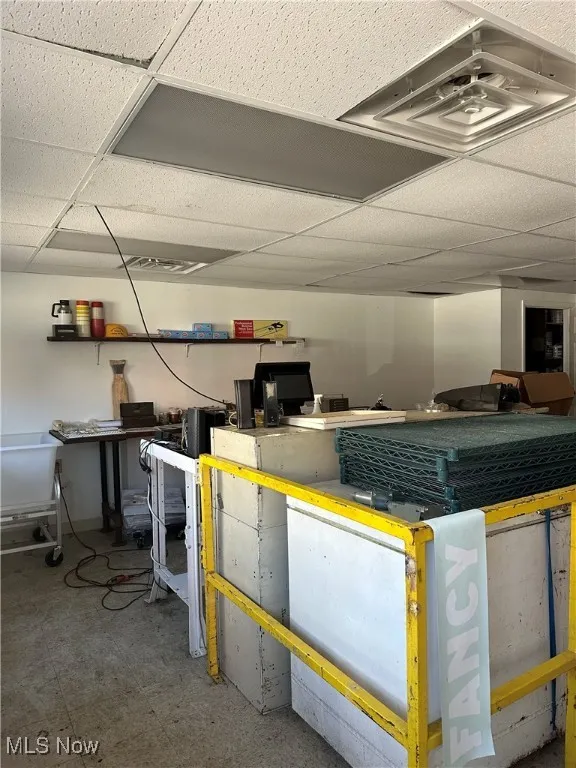 Basement featuring a paneled ceiling