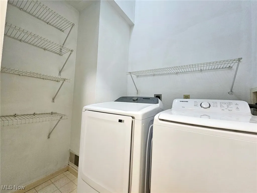  Laundry room with Newer Samsung  Large Washer and Dryer - Loads of storage space