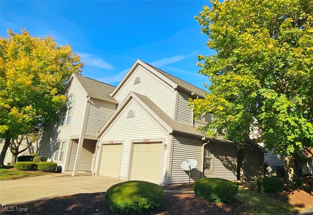 Side of condo showing garage