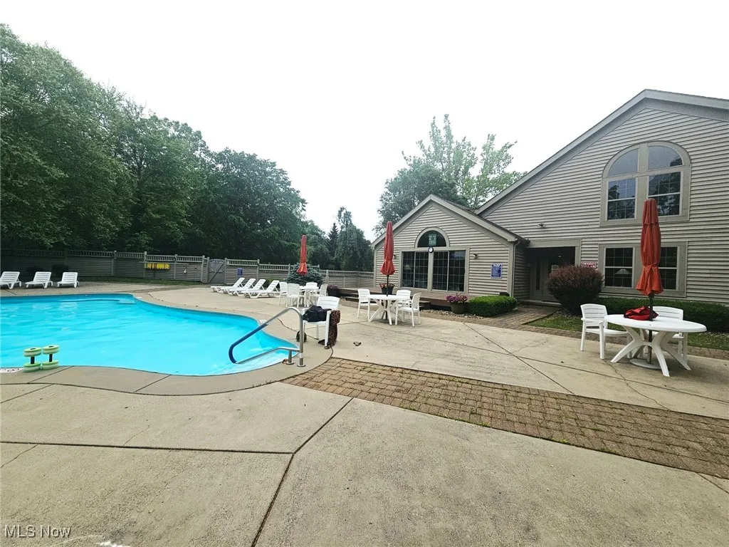 View of swimming pool with a patio