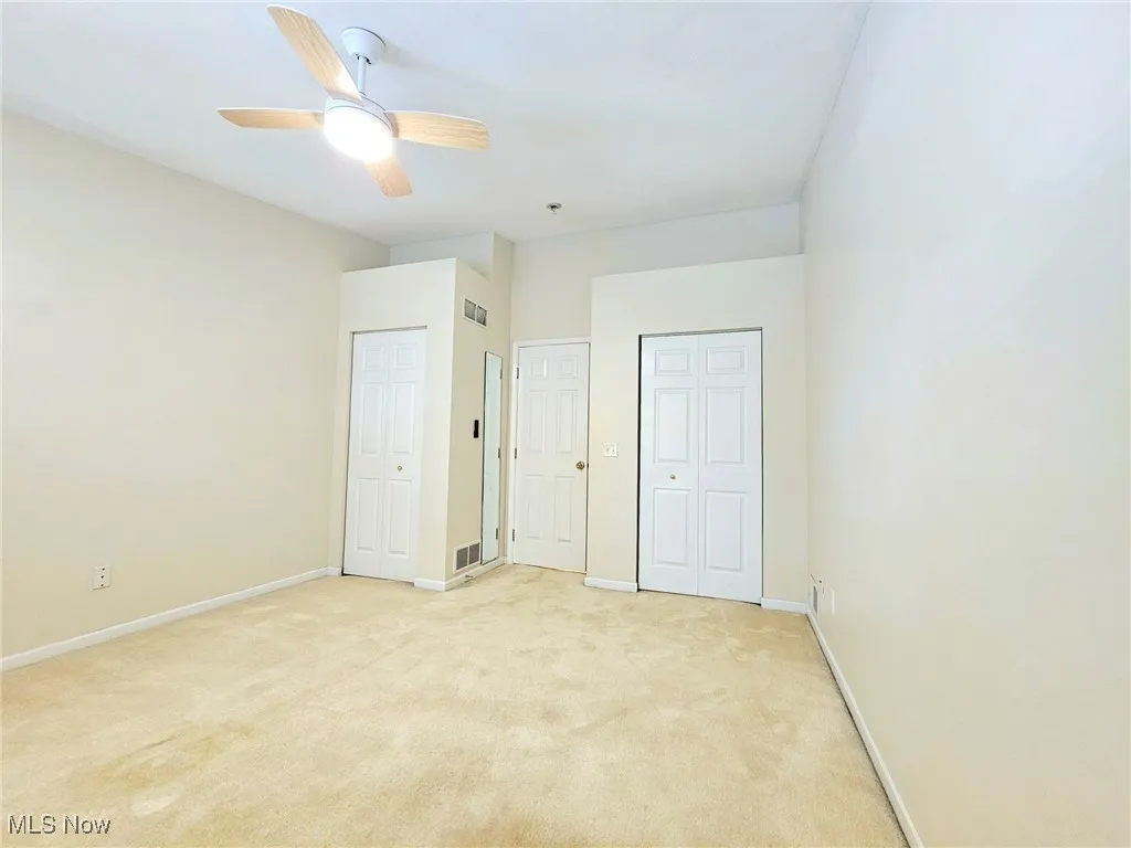 Double closets in secondary bedroom