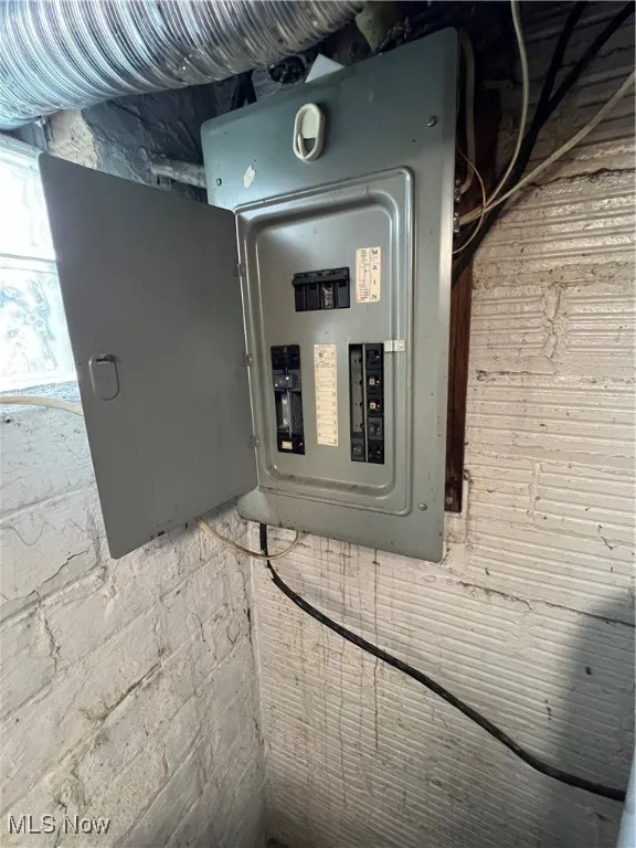 Utility room featuring electric panel