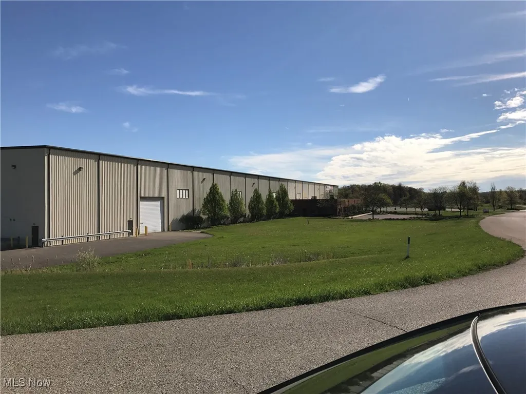 View of yard featuring a garage
