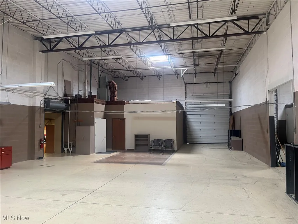 2500 Sq Feet Warehouse with loading dock and large overhead door.