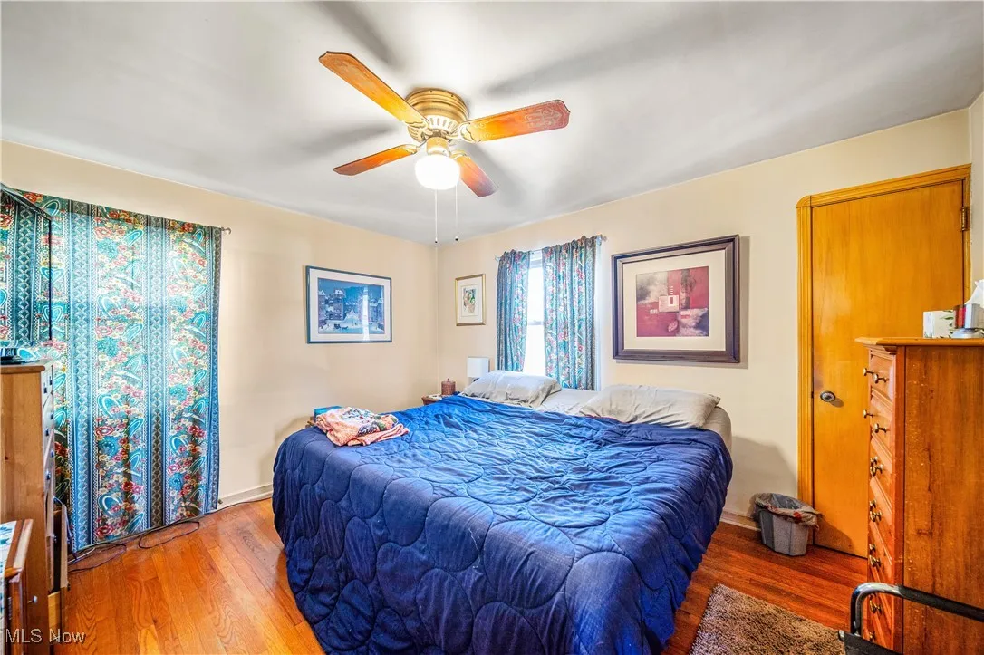 Main floor bedroom #1 with hardwood floors