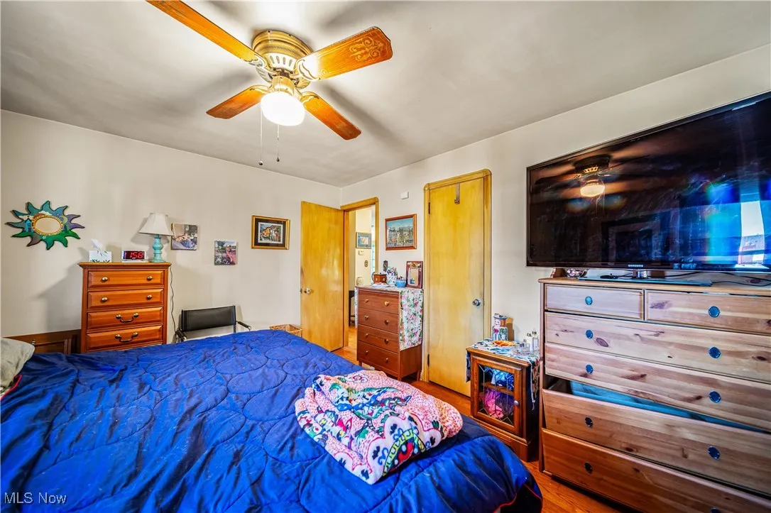 Main floor bedroom #1 with hardwood floors