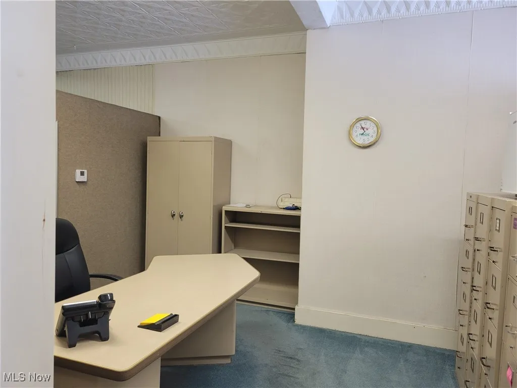 View of carpeted home office