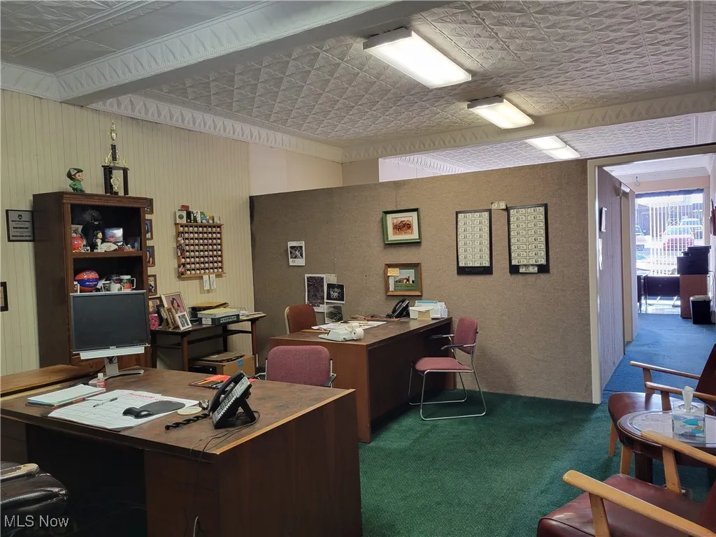 Office area with carpet flooring