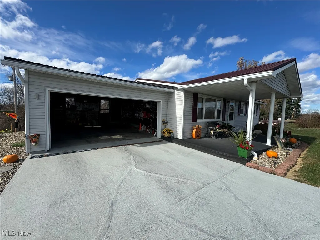 View of front of home featuring a garage