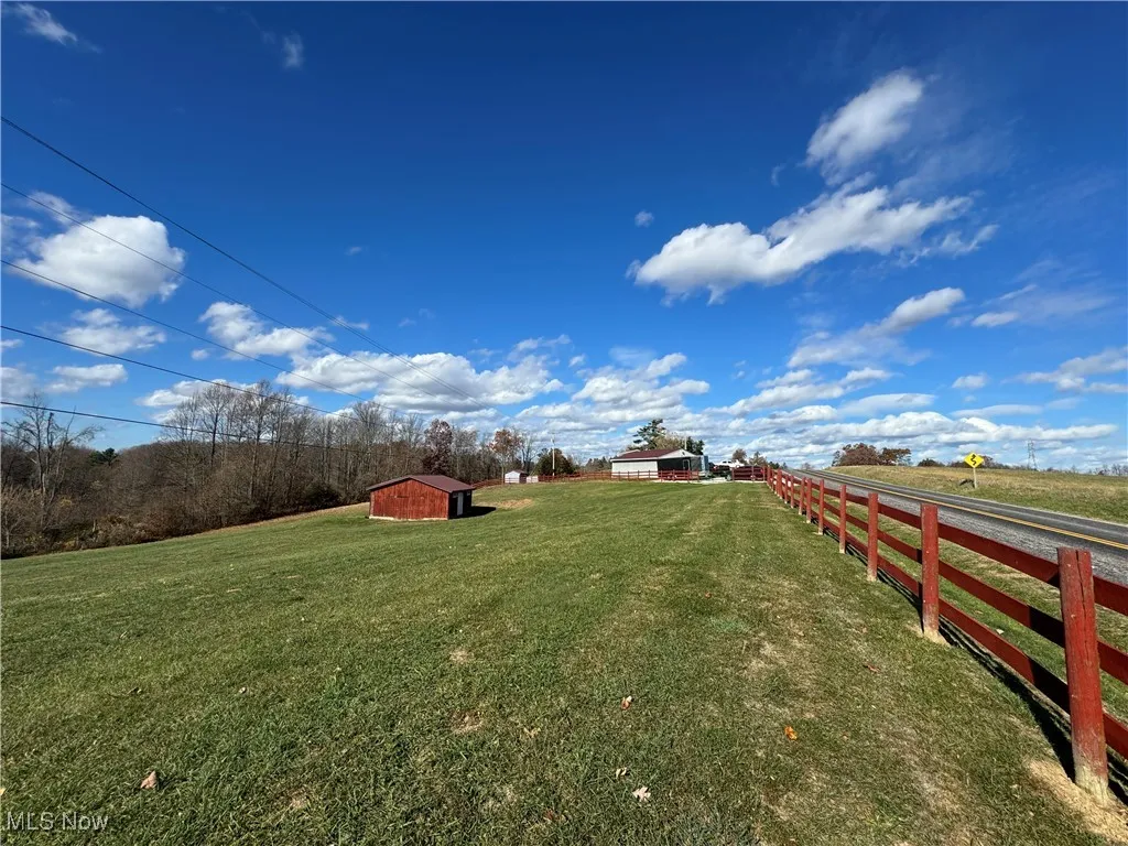 View overlooking horse barn and pasture