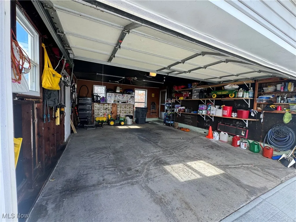 2 car garage featuring a garage door opener