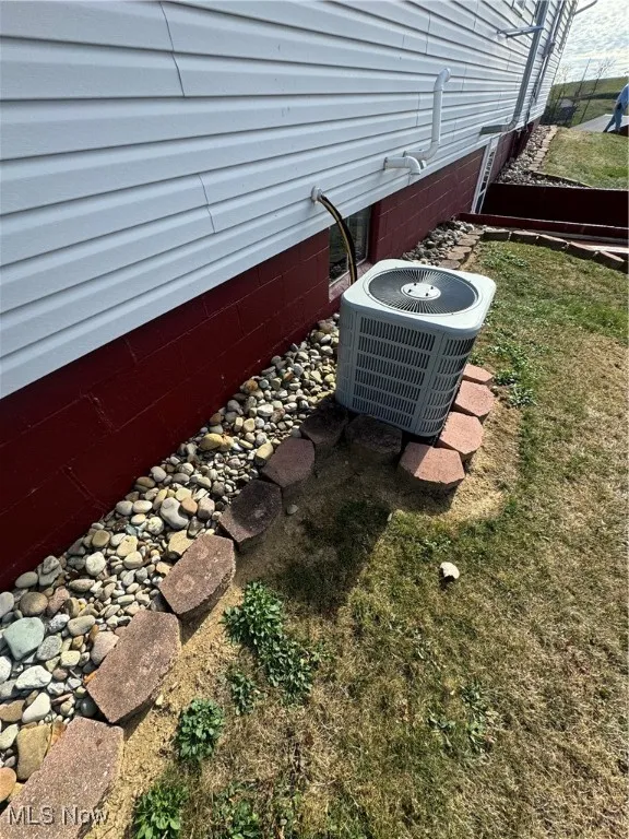 Exterior details featuring central AC