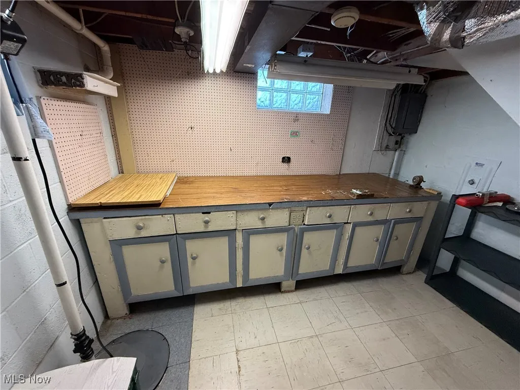 Basement with a workshop area