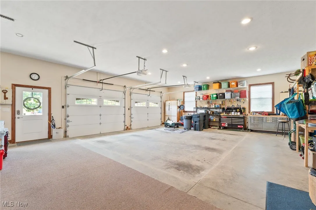 Garage featuring a workshop area