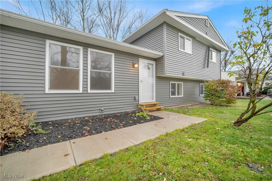 View of front of house with a front yard