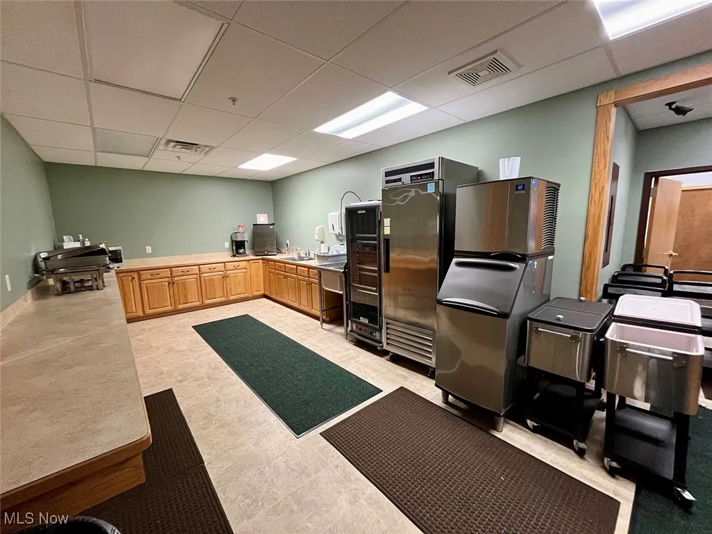 Kitchen with a paneled ceiling