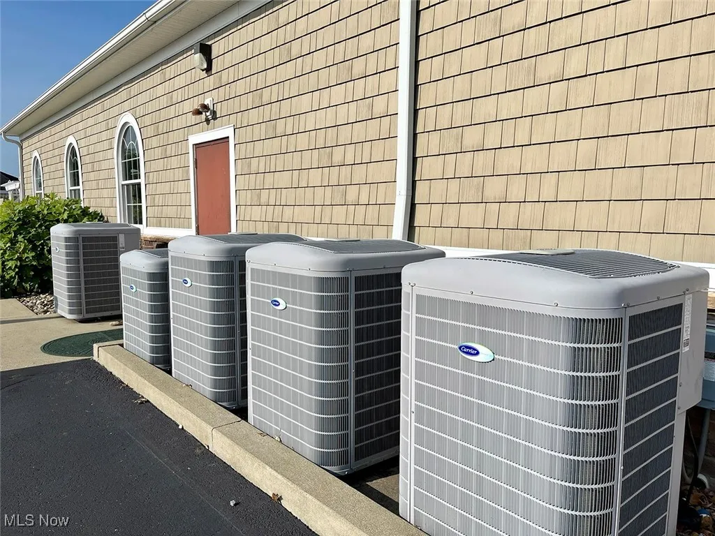 Exterior details with central air condition unit