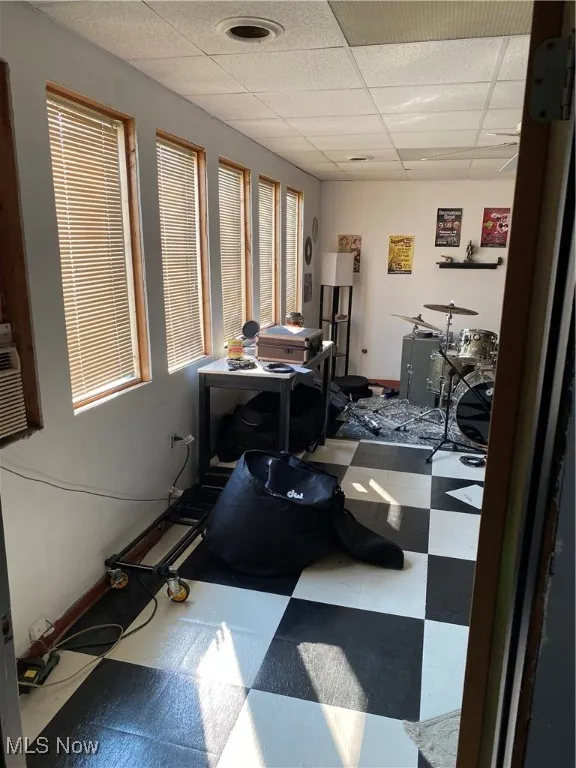 Office space featuring a paneled ceiling