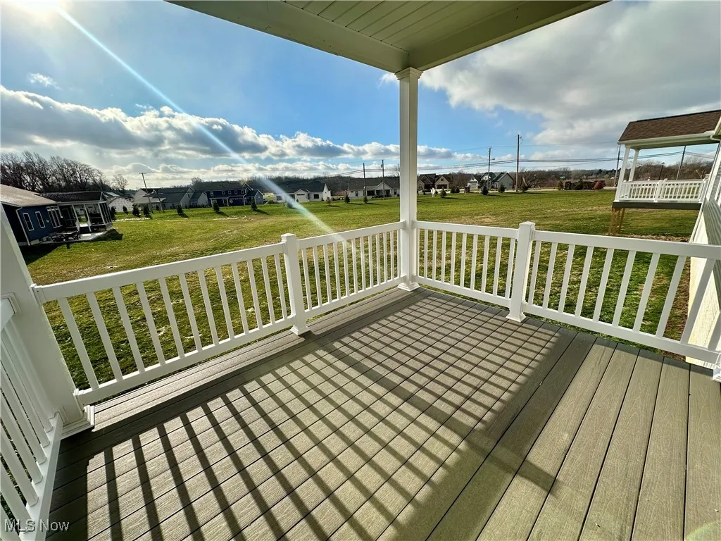 Wooden deck with a lawn
