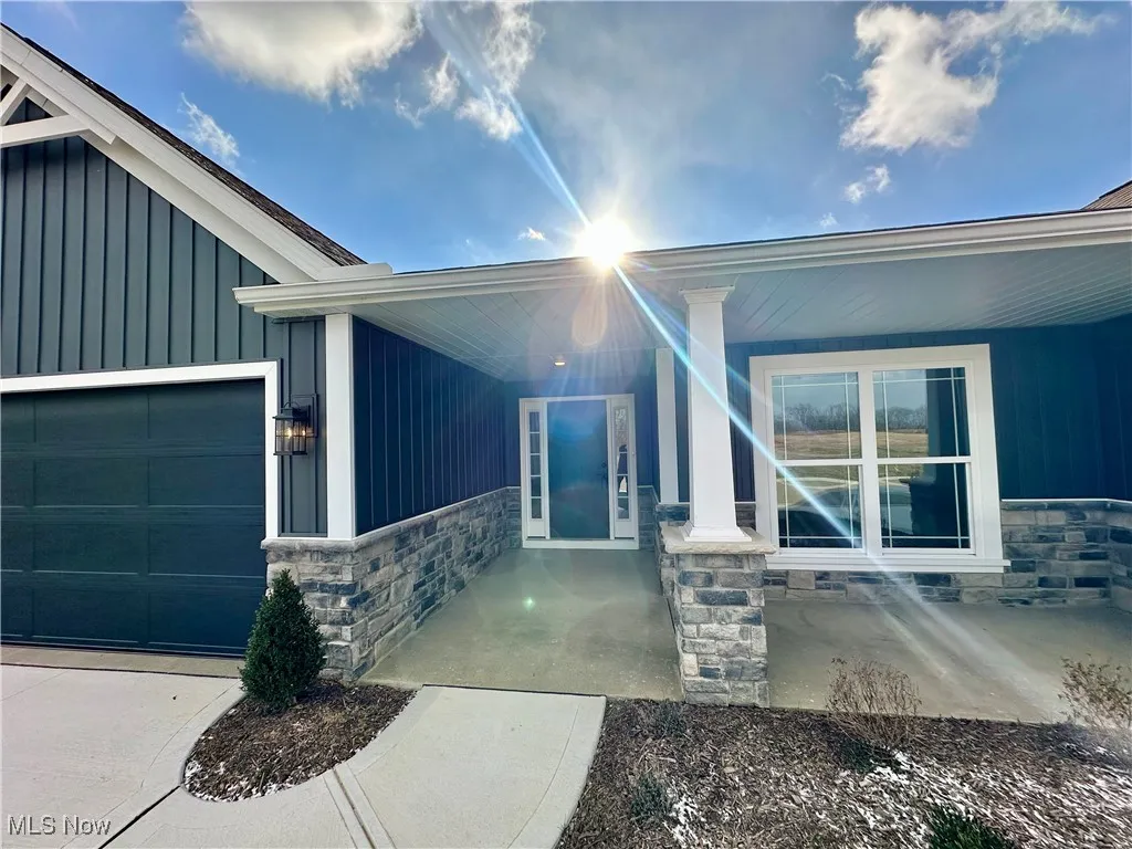 Property entrance featuring a garage