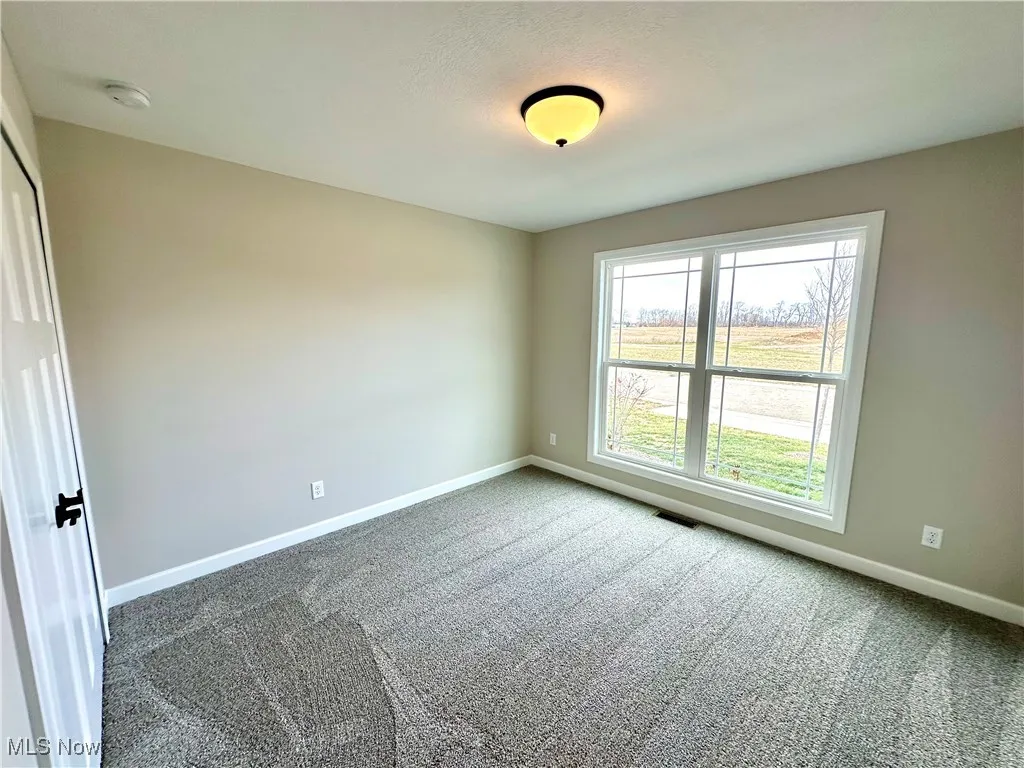 Spare room with carpet
