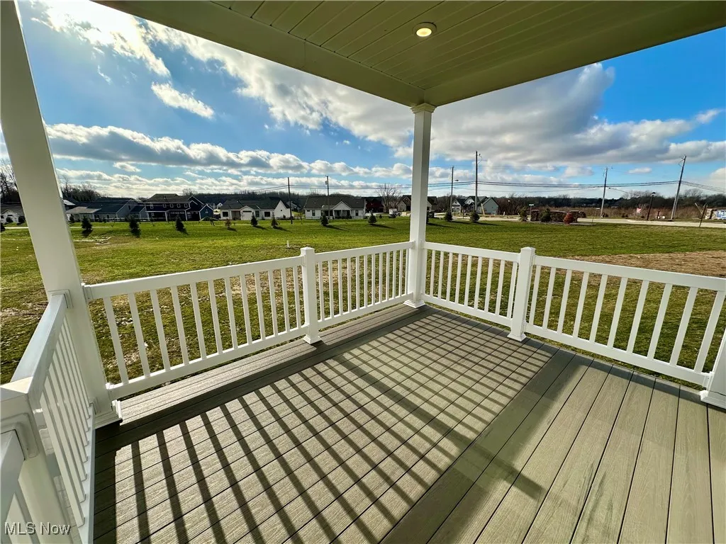Wooden deck with a lawn