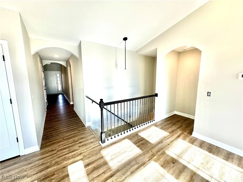 Hall featuring wood-type flooring