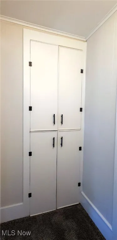 Upstairs linen closet provides ample space for linens and towels and other items.