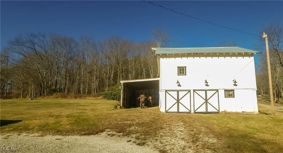View of bank barn. Space for 3 cars.