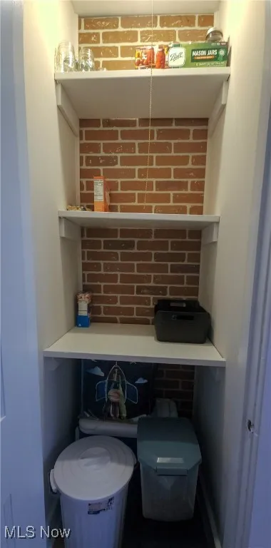 spacious pantry with light and easy access to the kitchen.