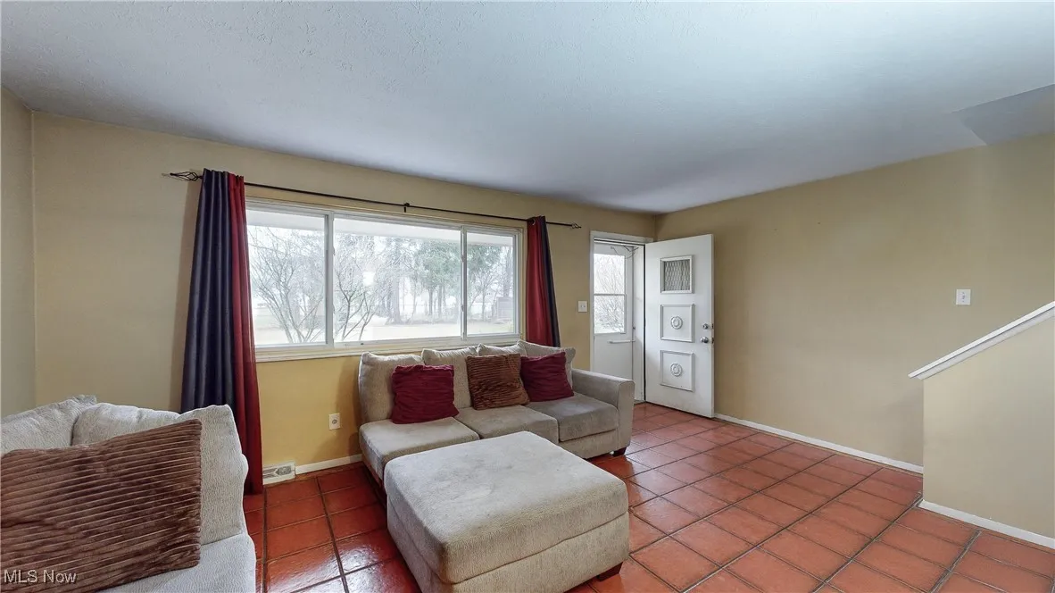 Living room with tile patterned floors