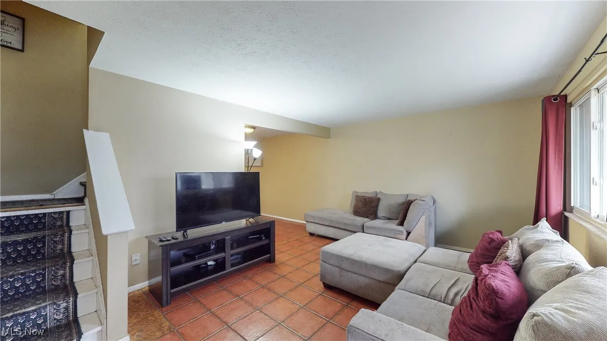 View of tiled living room
