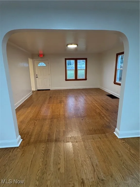 Entrance foyer with hardwood flooring