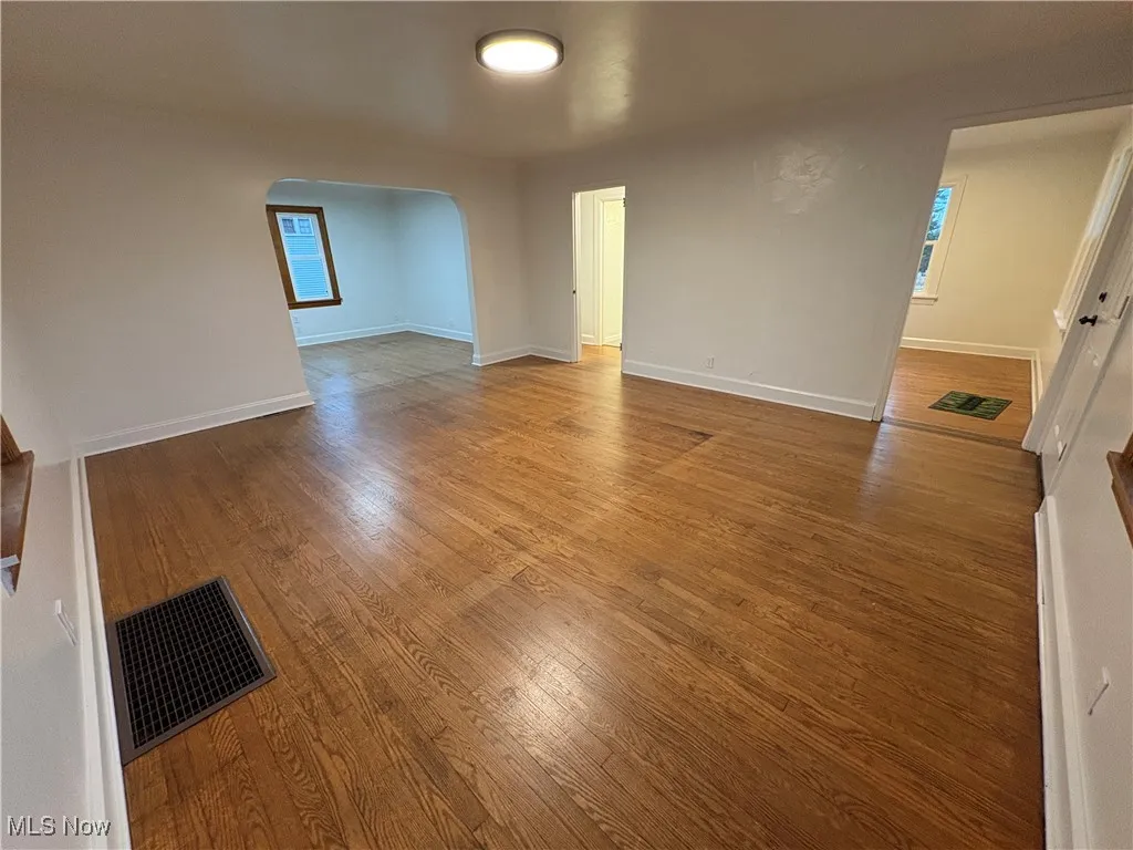 Large Room featuring hardwood flooring
