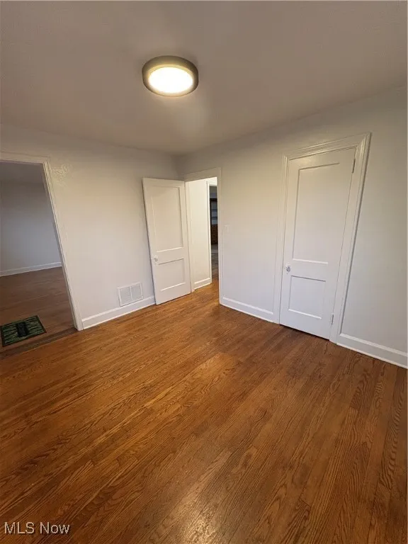 Room with hardwood flooring