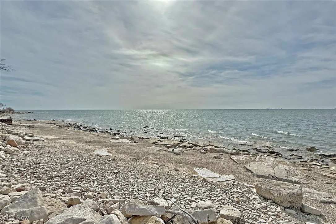 View of water feature with a beach view