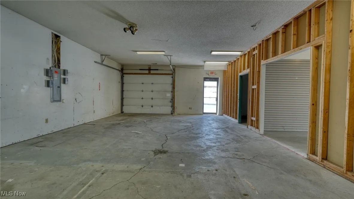 Garage featuring electric panel