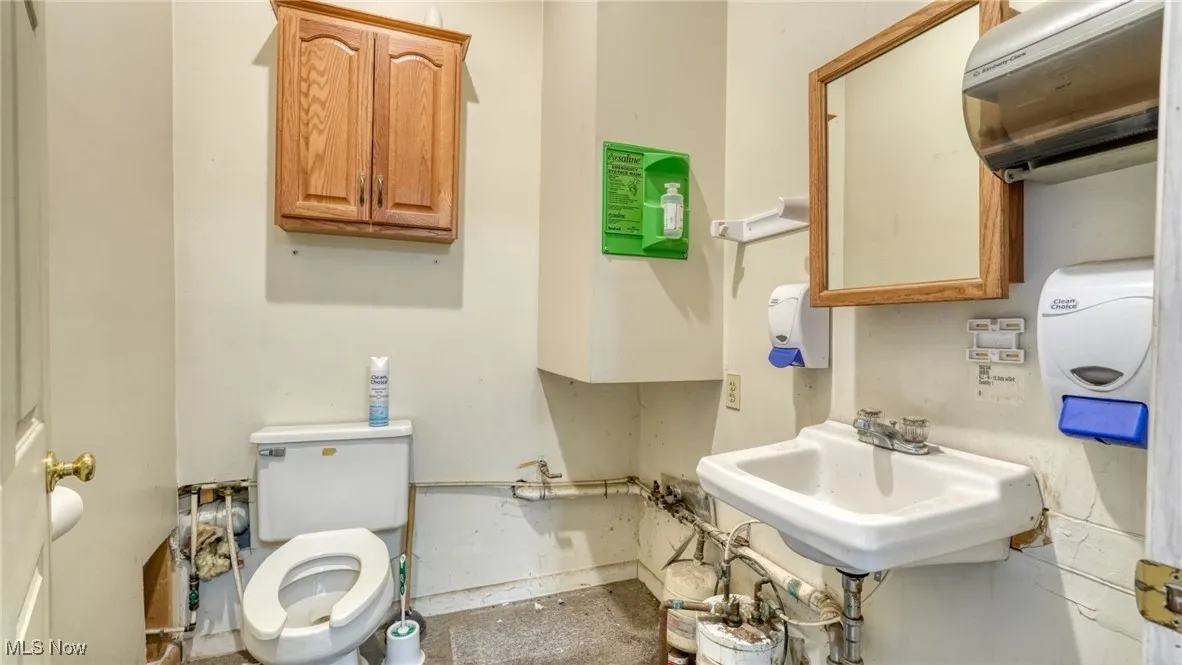 Bathroom with toilet and sink
