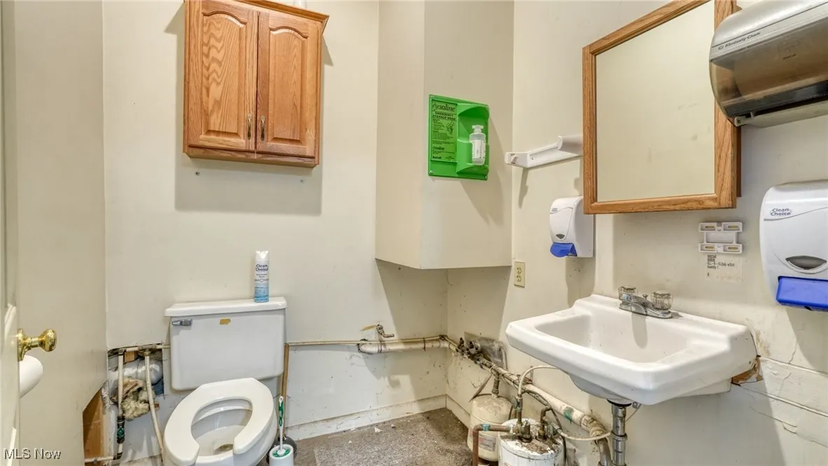 Bathroom featuring toilet and sink