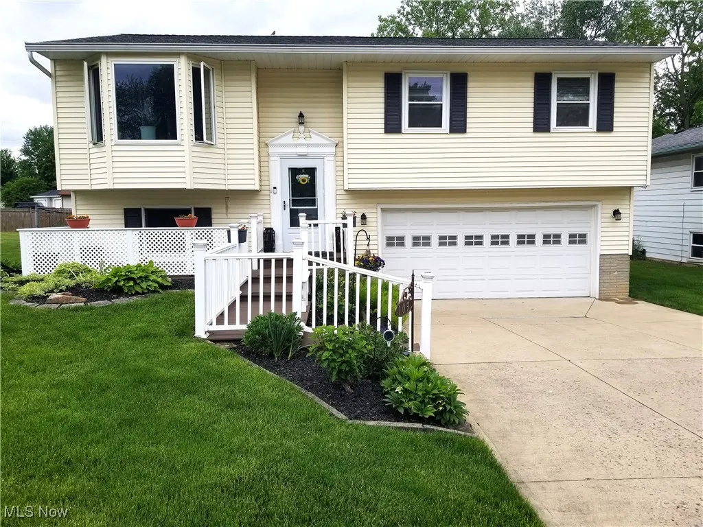 Front elevation of the home showing the entrance and sitting decks