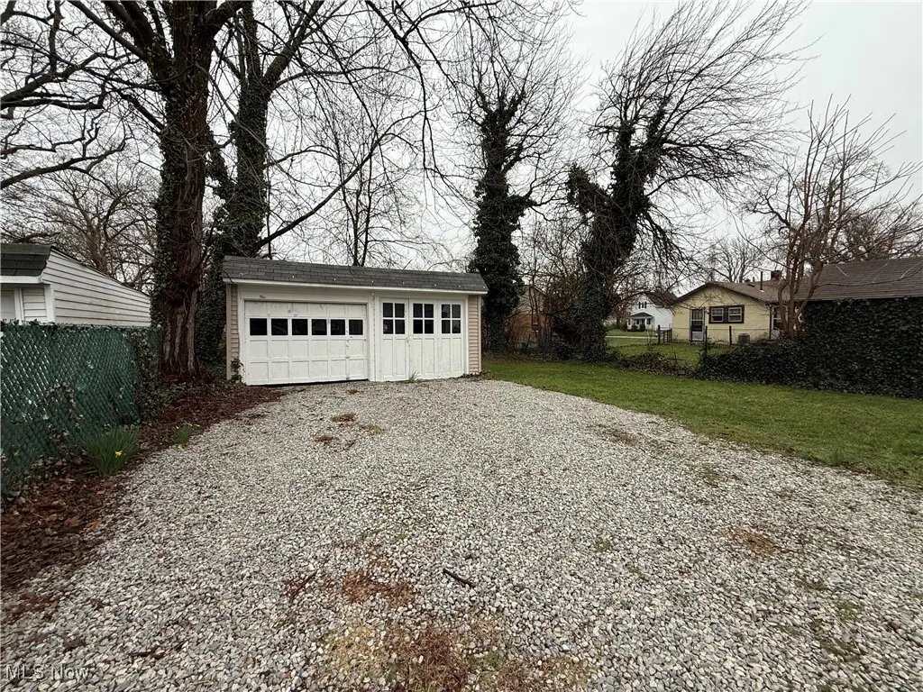 Detached garage with fence