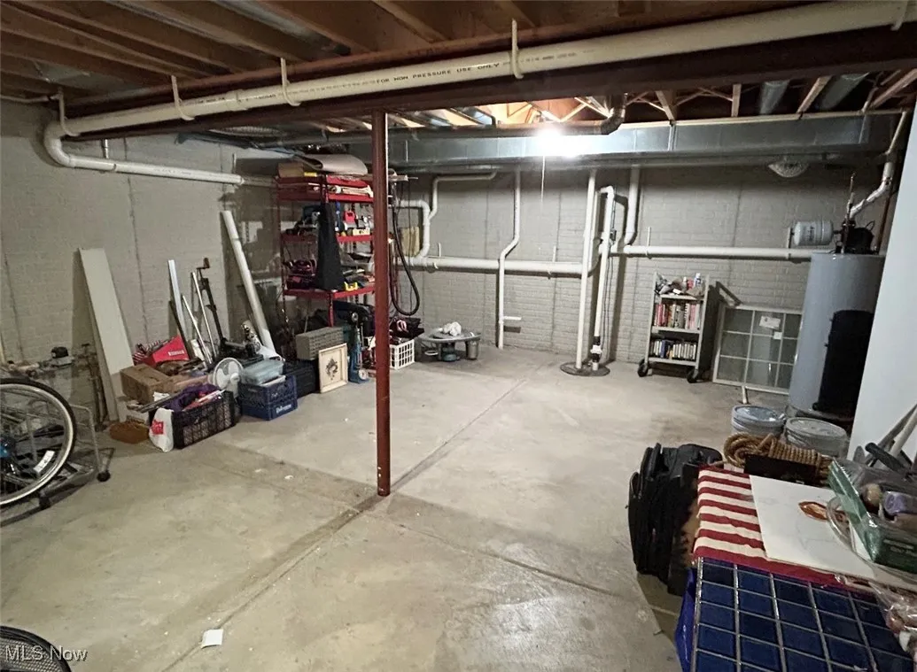 Unfinished basement with water heater